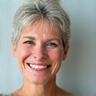 Portrait of Sarah T., a contented woman in her late 40s
